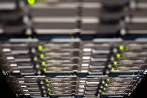 Server rack with magnifying glass highlighting optimal server utilization