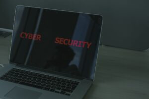 Fortified firewall shielding server from cyber threats with glowing blue circuits in background