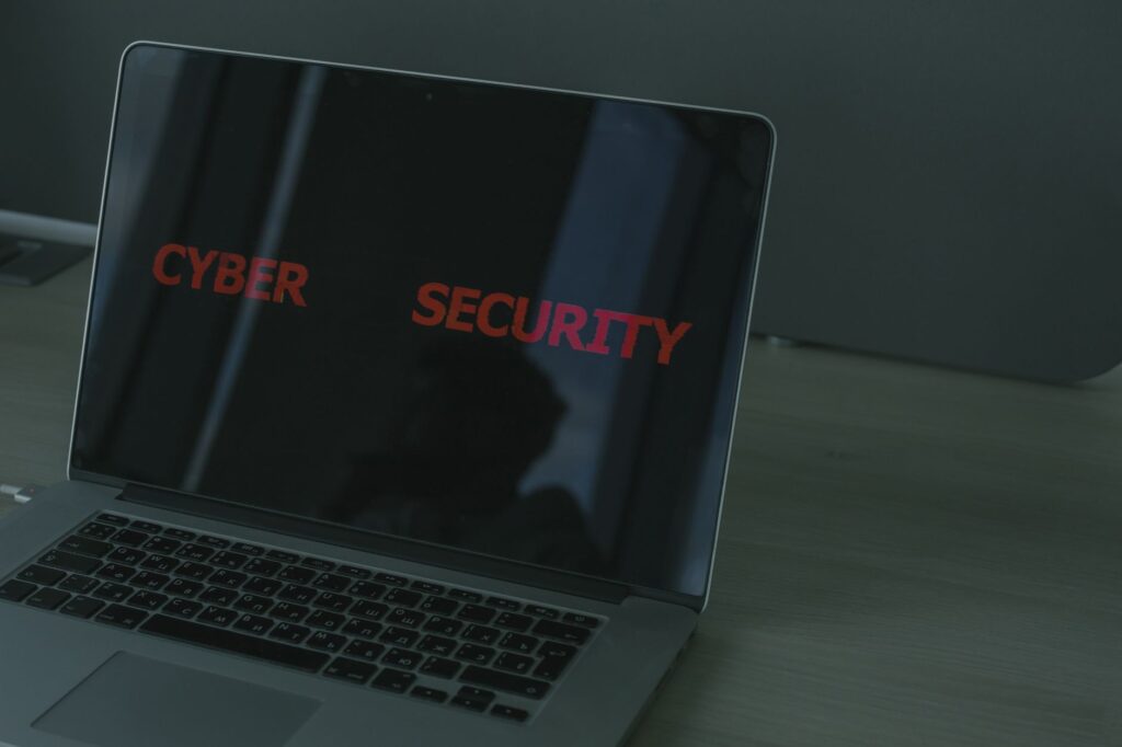 Fortified firewall shielding a server from cyber threats with glowing blue circuits