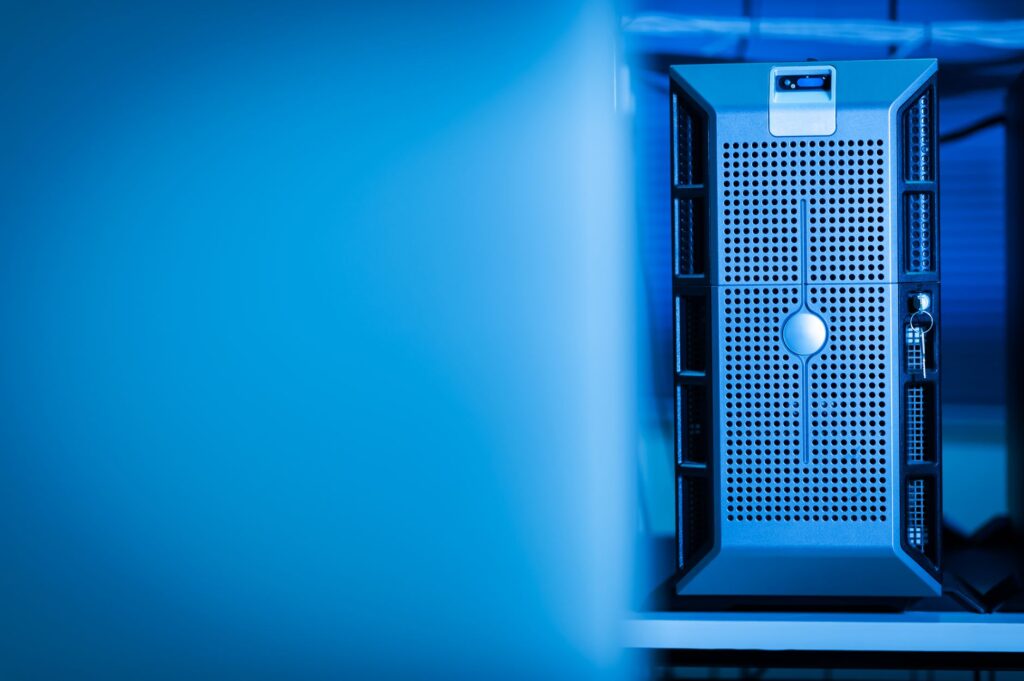 Dark digital illustration of a central server processing glowing data streams connected to transparent cubes representing isolated CloudLinux LVE tenant environments.